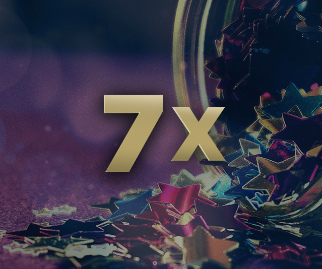 7x on top of a background with stars