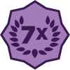 purple hexagon with 7x in the middle with leaves around it