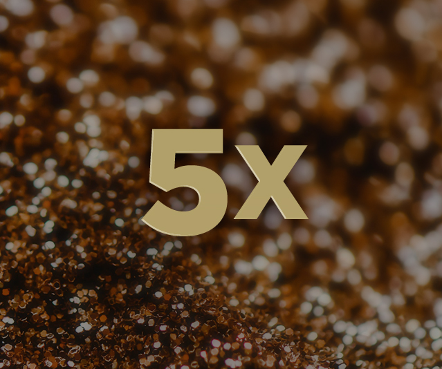 '5X' in the middle with blurred purple lights in the background